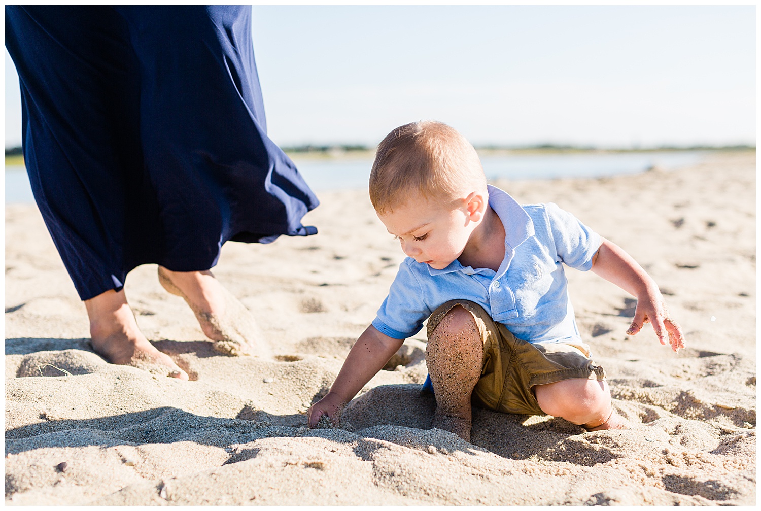 toddler playing in sand on cape cod beach