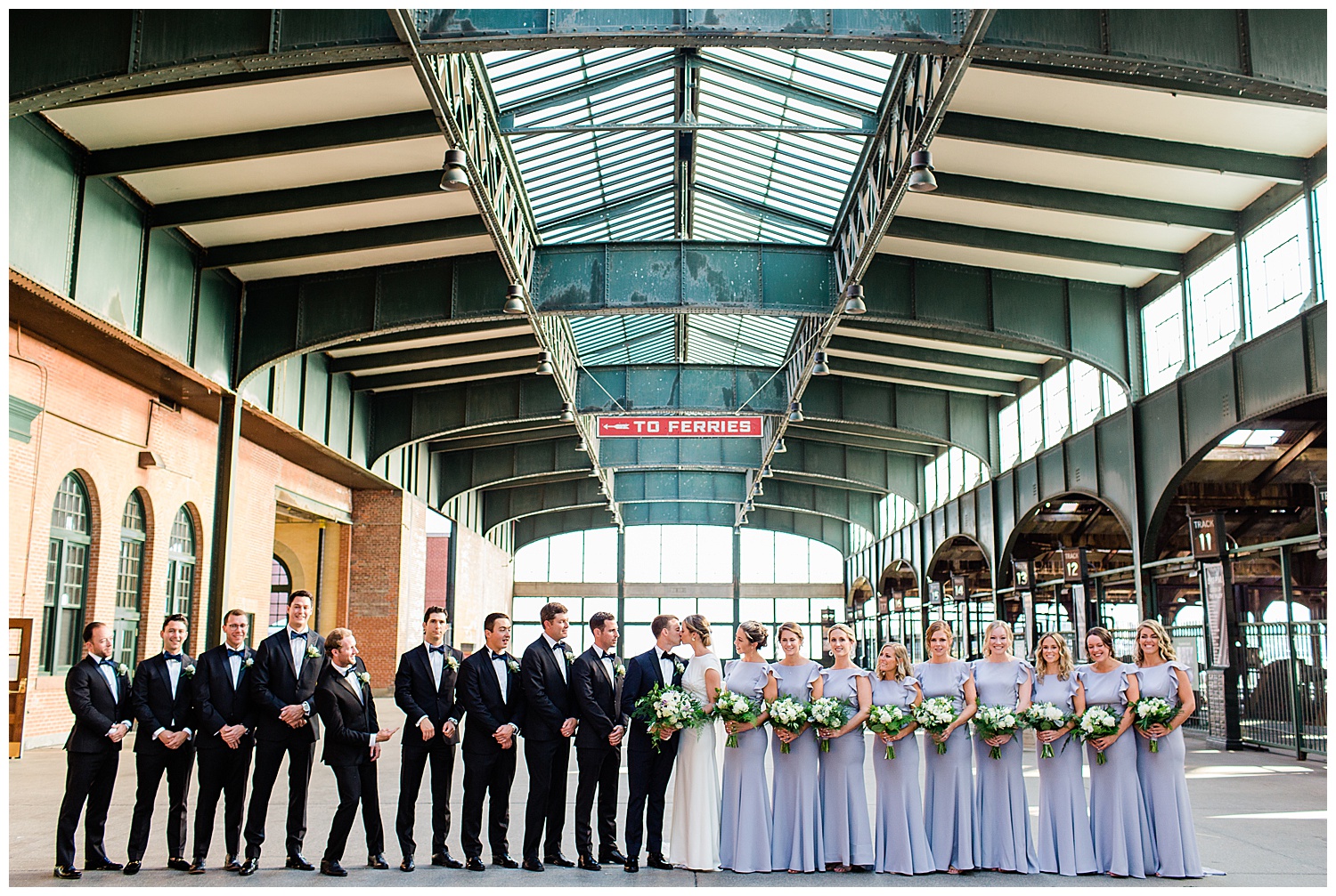 wedding party picture in vintage railroad terminal