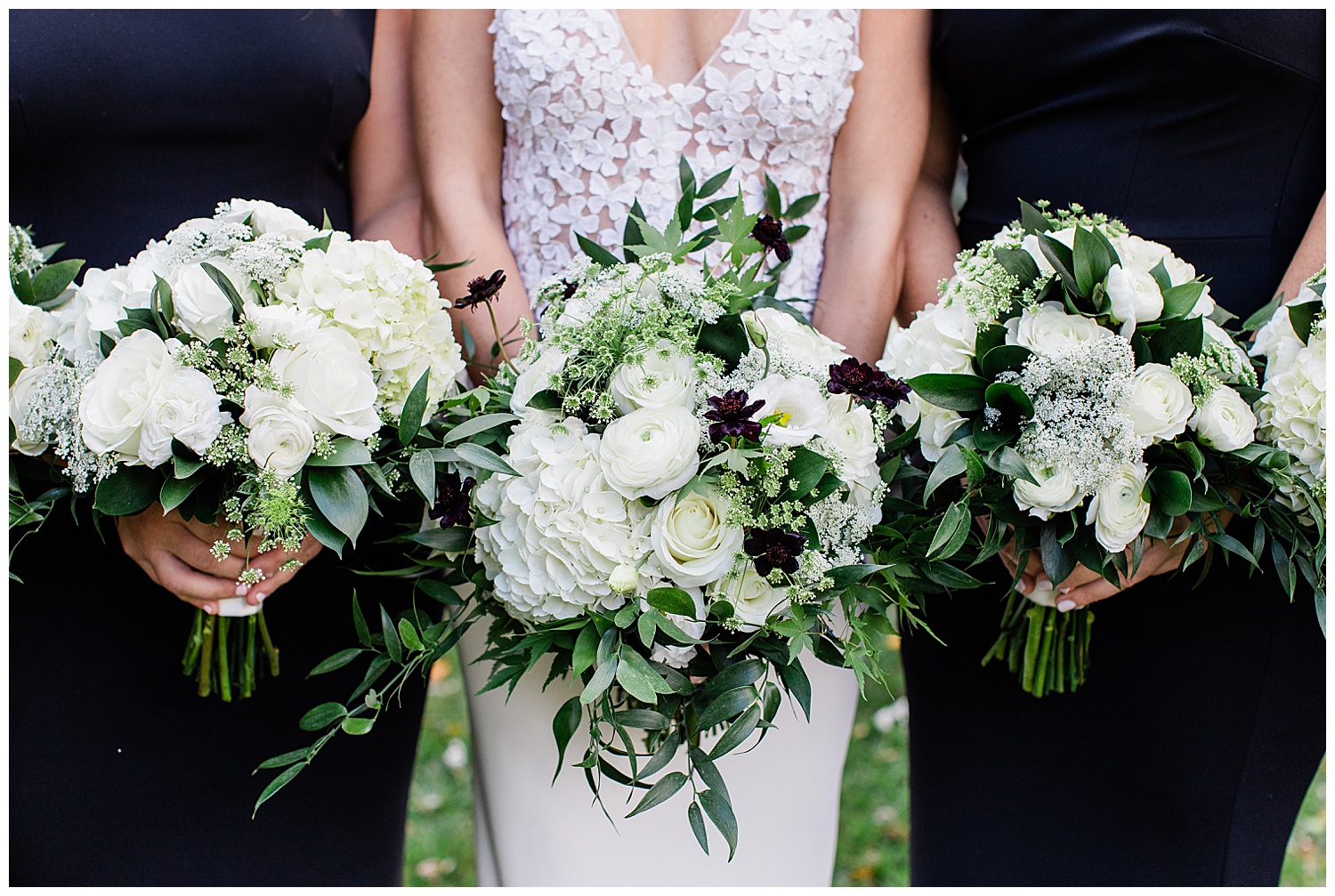 elegant white and green wedding bouquets with black accents